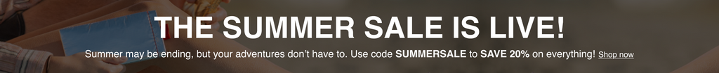 Summer sale banner with promotional text and code on a dark background